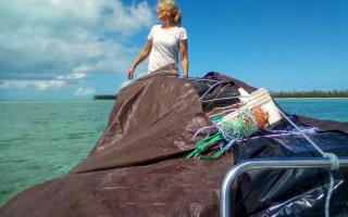 Fishing for plastic volunteer clean up of beach
