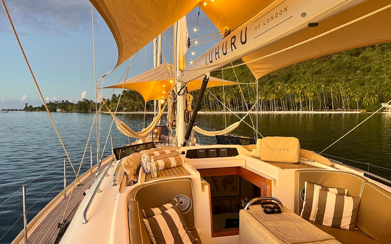 Uhuru Yacht At Night With Fairy Lights