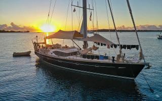 Uhuru Yacht At Anchor Sunset Time