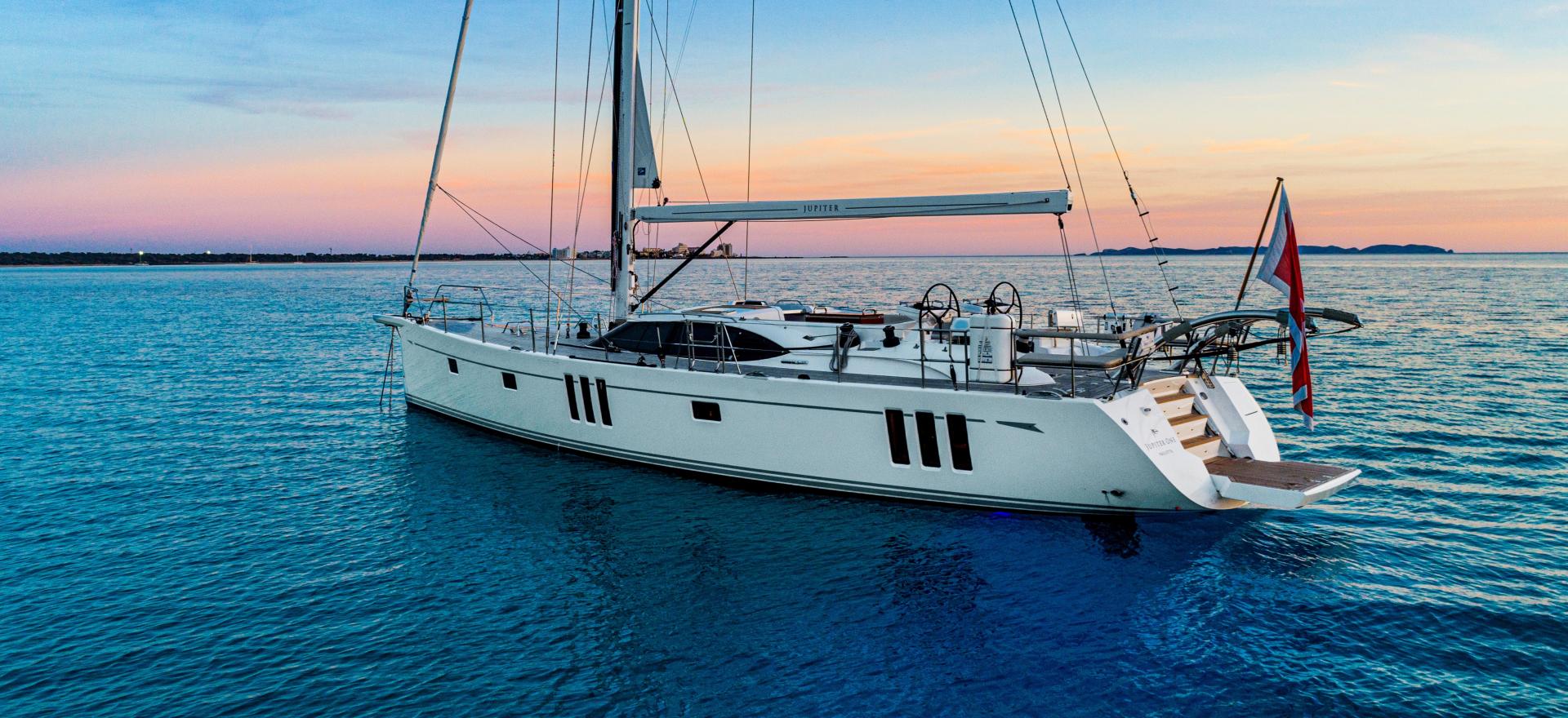 60 foot sailing yacht at anchor sunset 3