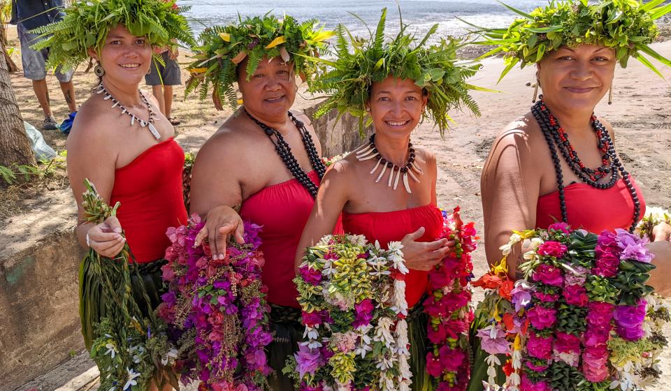 Local women flower necklaces Nuku Hiva Marquesas