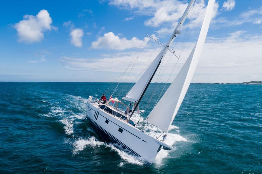 Oyster 565 cruising front on