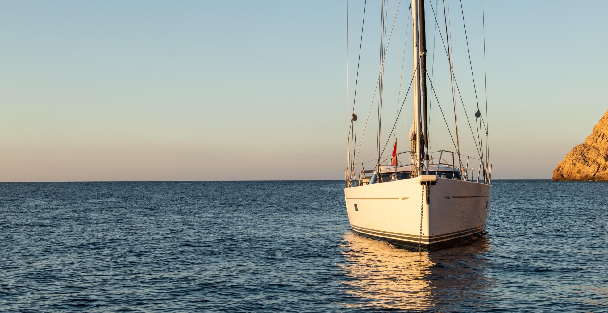 Oyster 745 at anchor at sunset