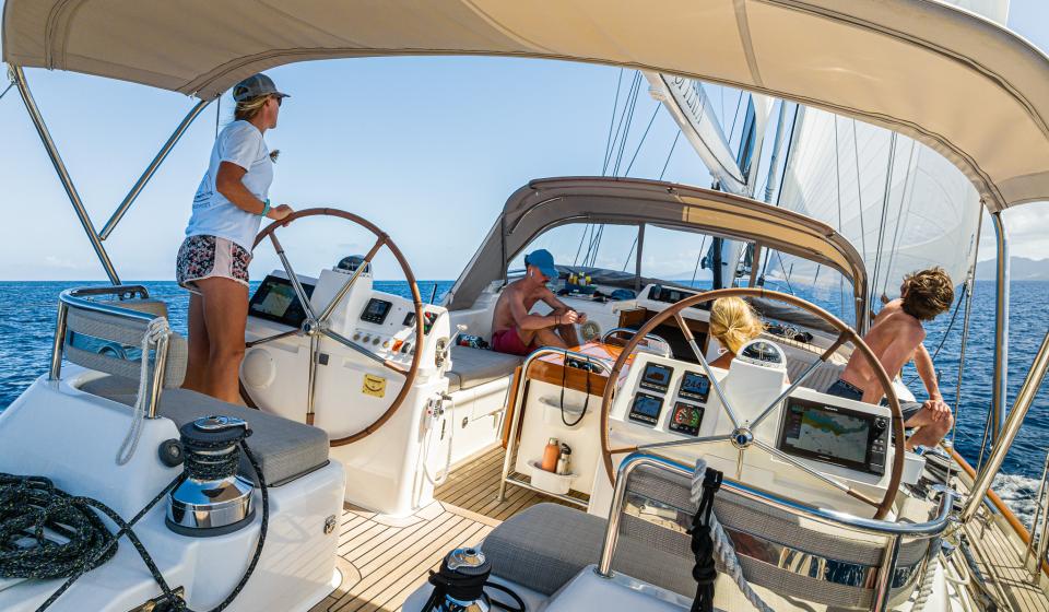People on board Oyster Yacht sailing Fiji