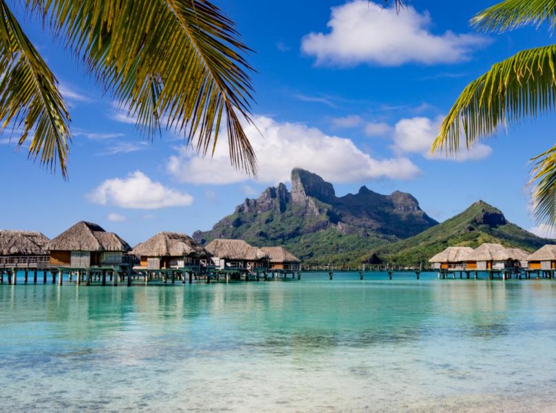 Posh bungalows villas in upmarket seaside resort Bora Bora d v2