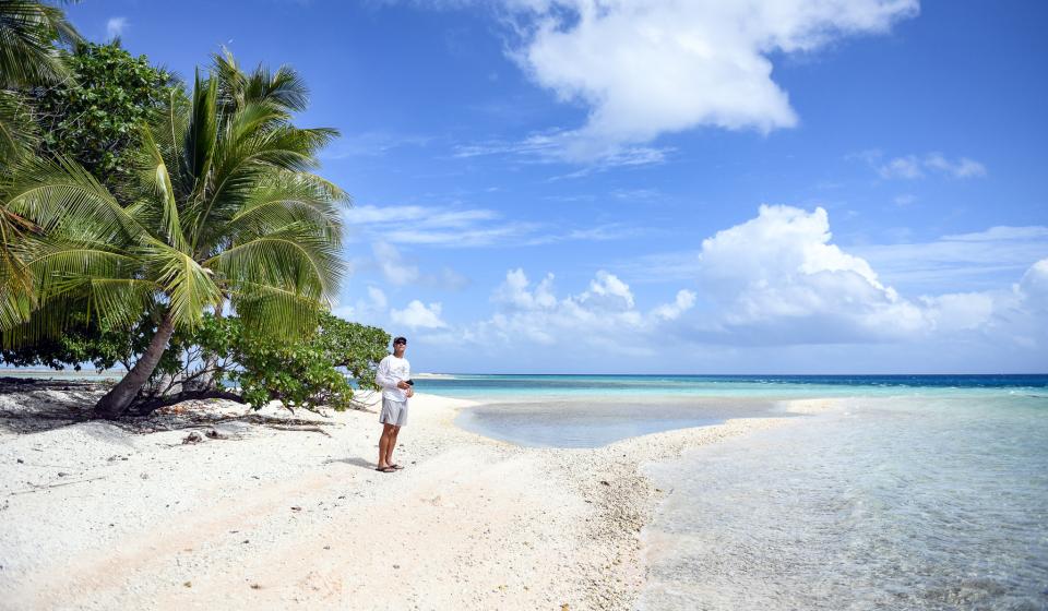 White sand beach Tuamotu Islands French Polynesia