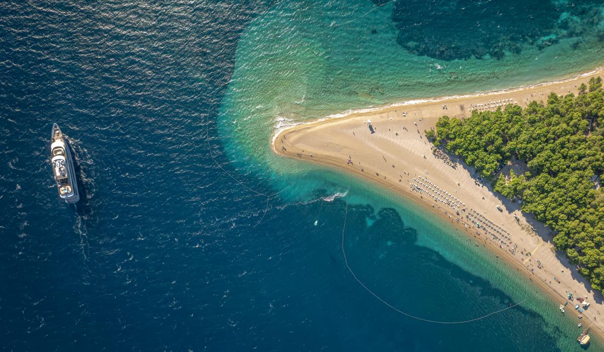 4. FREEDOM Cruising by Zlatni rat island Brac