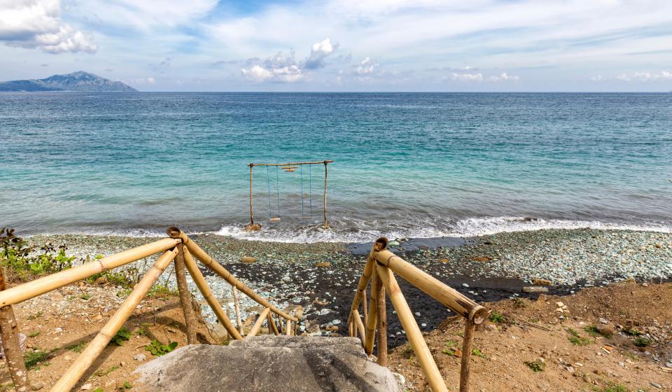 55. Swing in sea on the beach