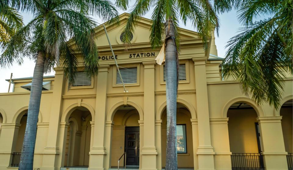 84. Mackay Police Station with palm trees