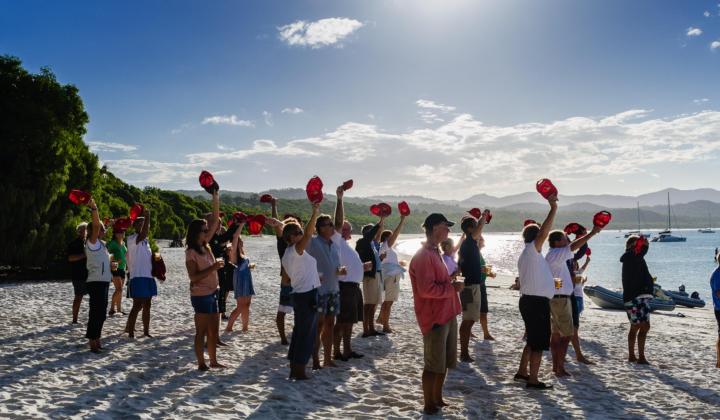 86. Oyster World Rally participants on sandy beach White sundays