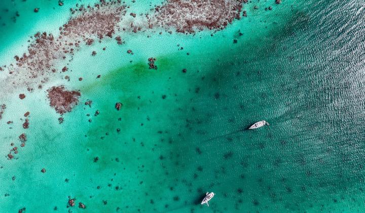 Drone shot of Oyster yachts in Kauehi Tuamotus French Polynesia