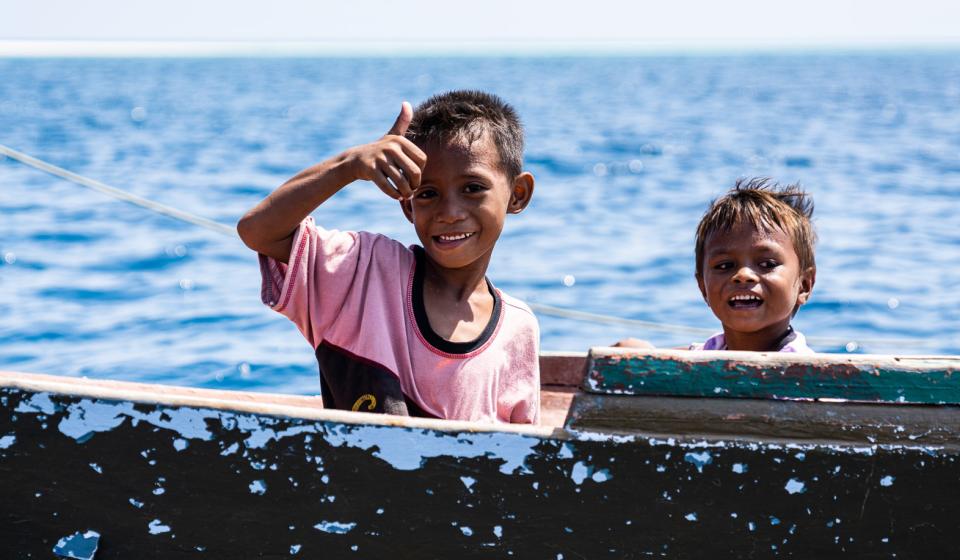 Kids on boat Indonesia