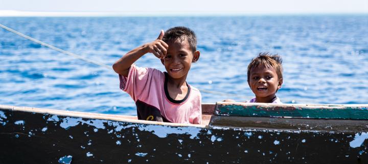 Kids on boat Indonesia