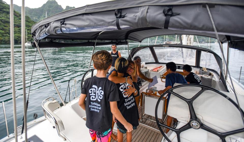 Local children on board Oyster 575 Ahlam Moorea