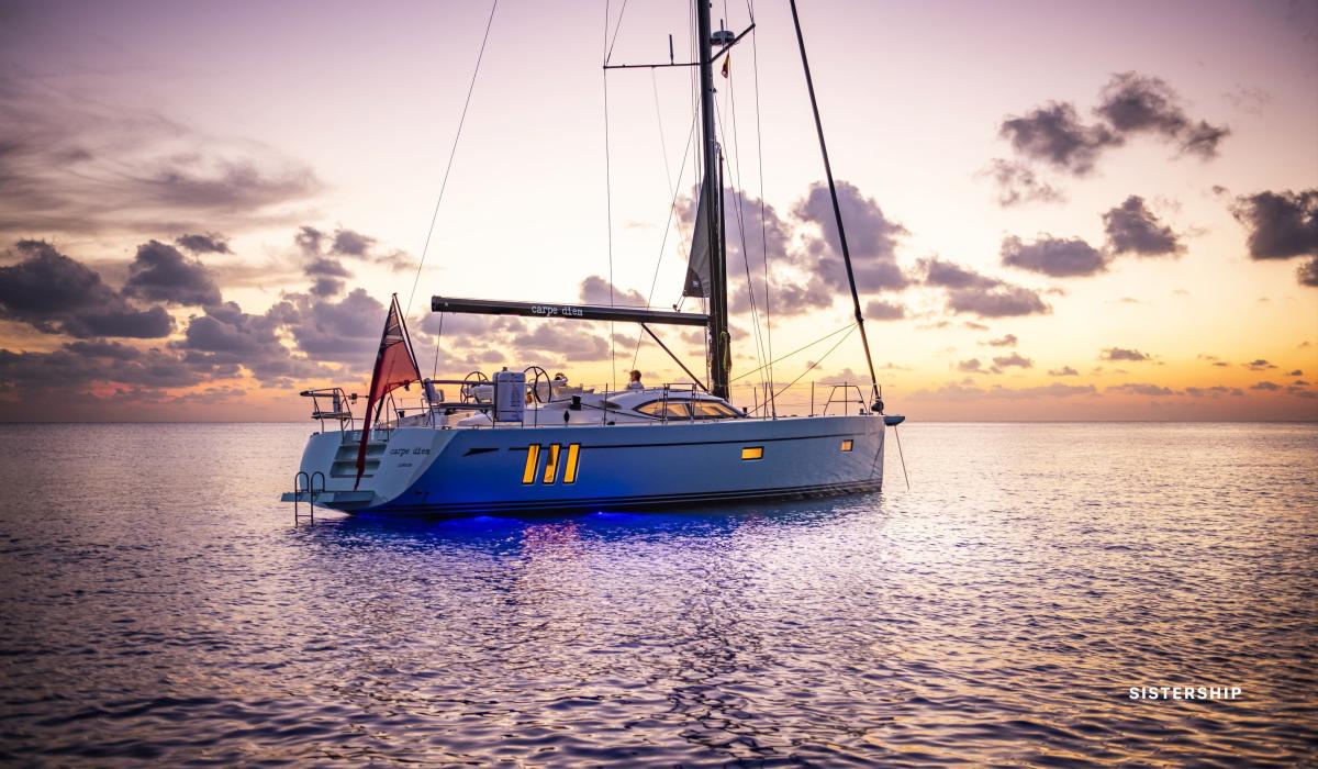Oyster 495 Aquaries At Anchor Sunset Sailing Charter