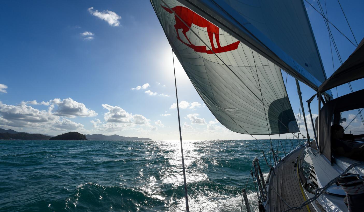 Oyster 595 Jazofi sailing towards Panama spinnaker up