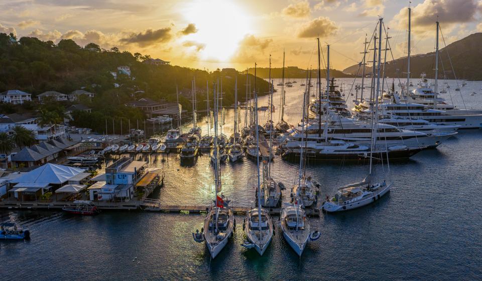 Oyster World Rally 2026 27 fleet at Antigua Superyacht Marina sunset
