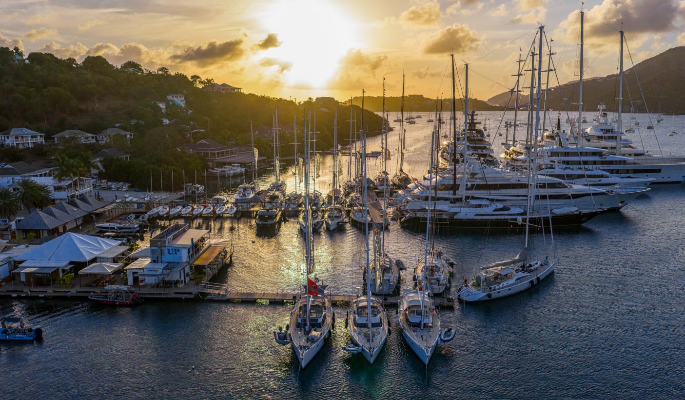 Oyster World Rally 2026 27 fleet at Antigua Superyacht Marina sunset