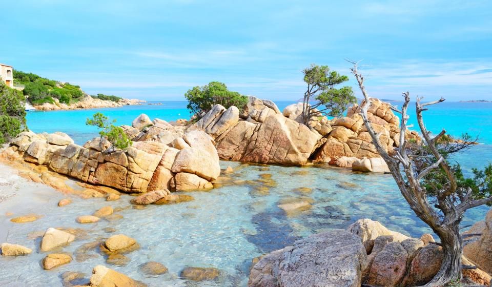 Rocks in Capriccioli beach Italy