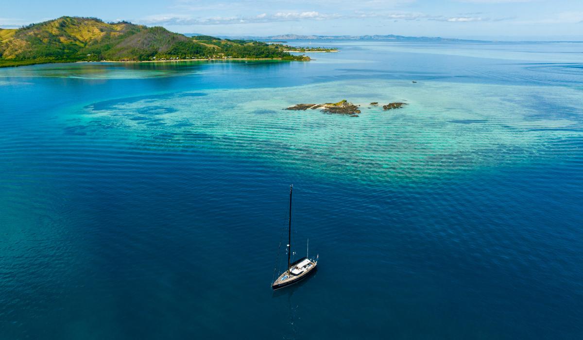 Sailing yacht at anchor in Fiji atoll