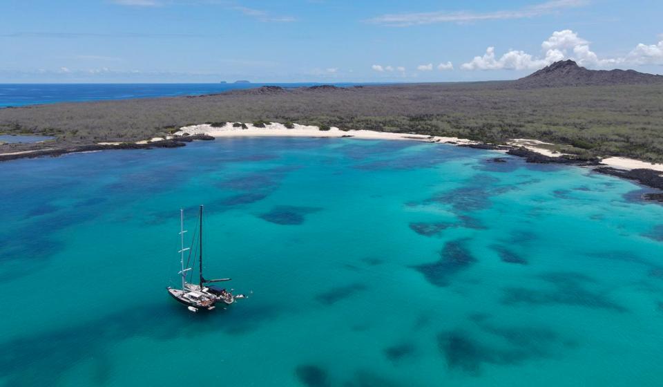 Sailing yachts at anchor Galapagos Islands