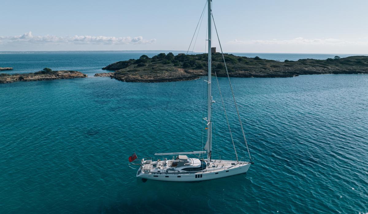 bluewater sailing yacht at anchor at sea