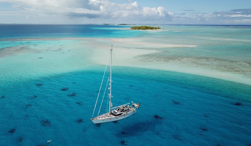 oyster yacht at anchor in remote location