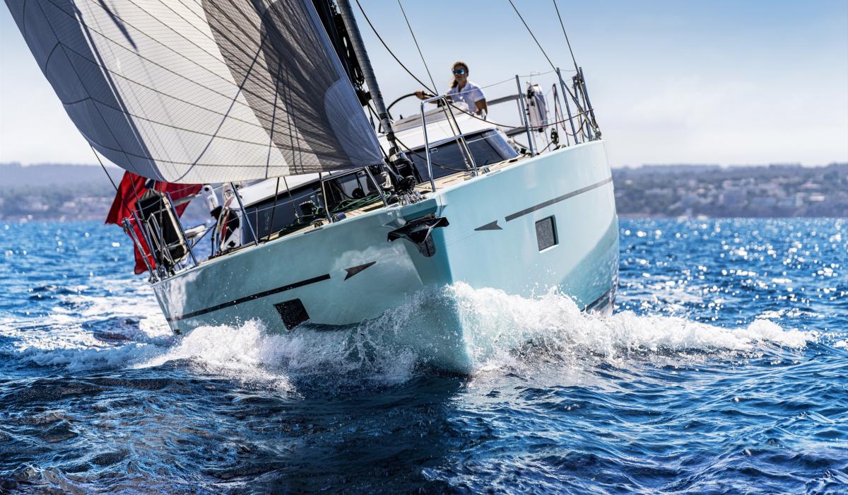 sailing yacht riding the waves