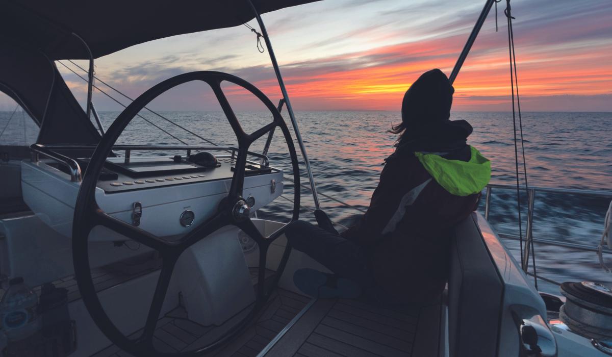 women watching sunset atlantic ocean