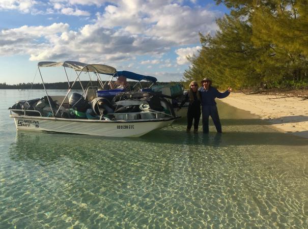 Fishing for plastic volunteers cleaning up a beach in the Bahamas v2