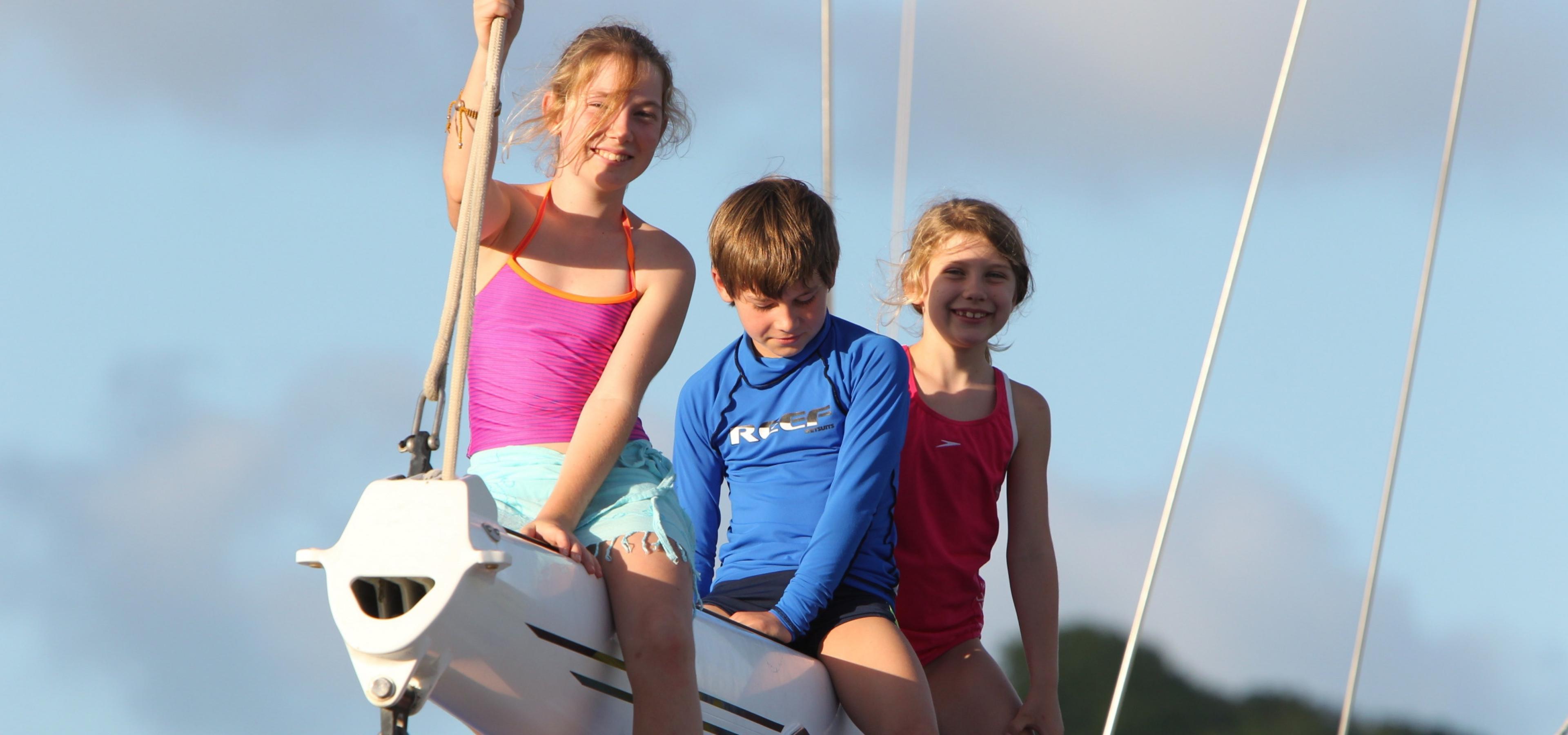 https://oysteryachts.com/assets/intro-images/Three-children-on-sailing-boats-boom__Resampled.jpg