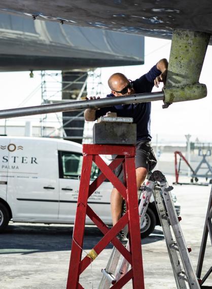 oyster service team fixing boat