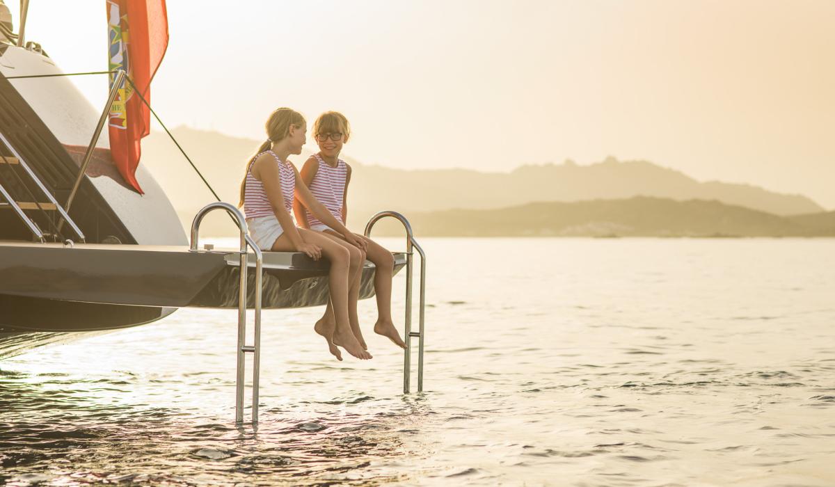 Oyster Yachts Oyster 885 90 foot sailing yacht swim platform sunset