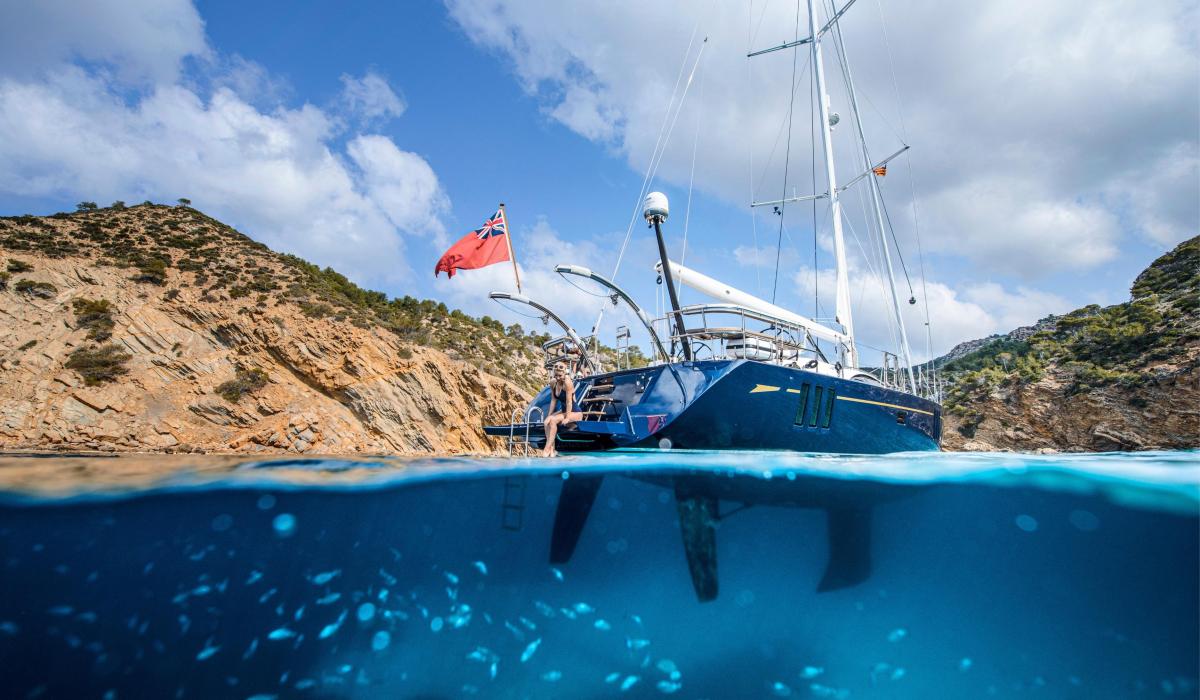 lady on swim platform oyster yacht